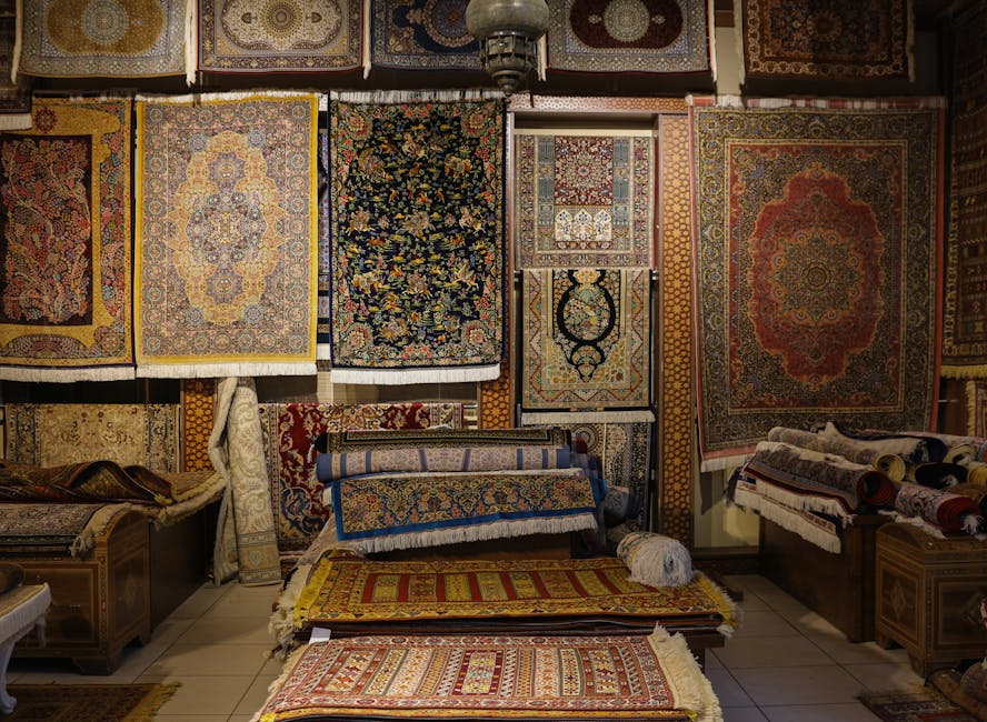 A captivating display of intricately designed traditional rugs in a cozy shop.